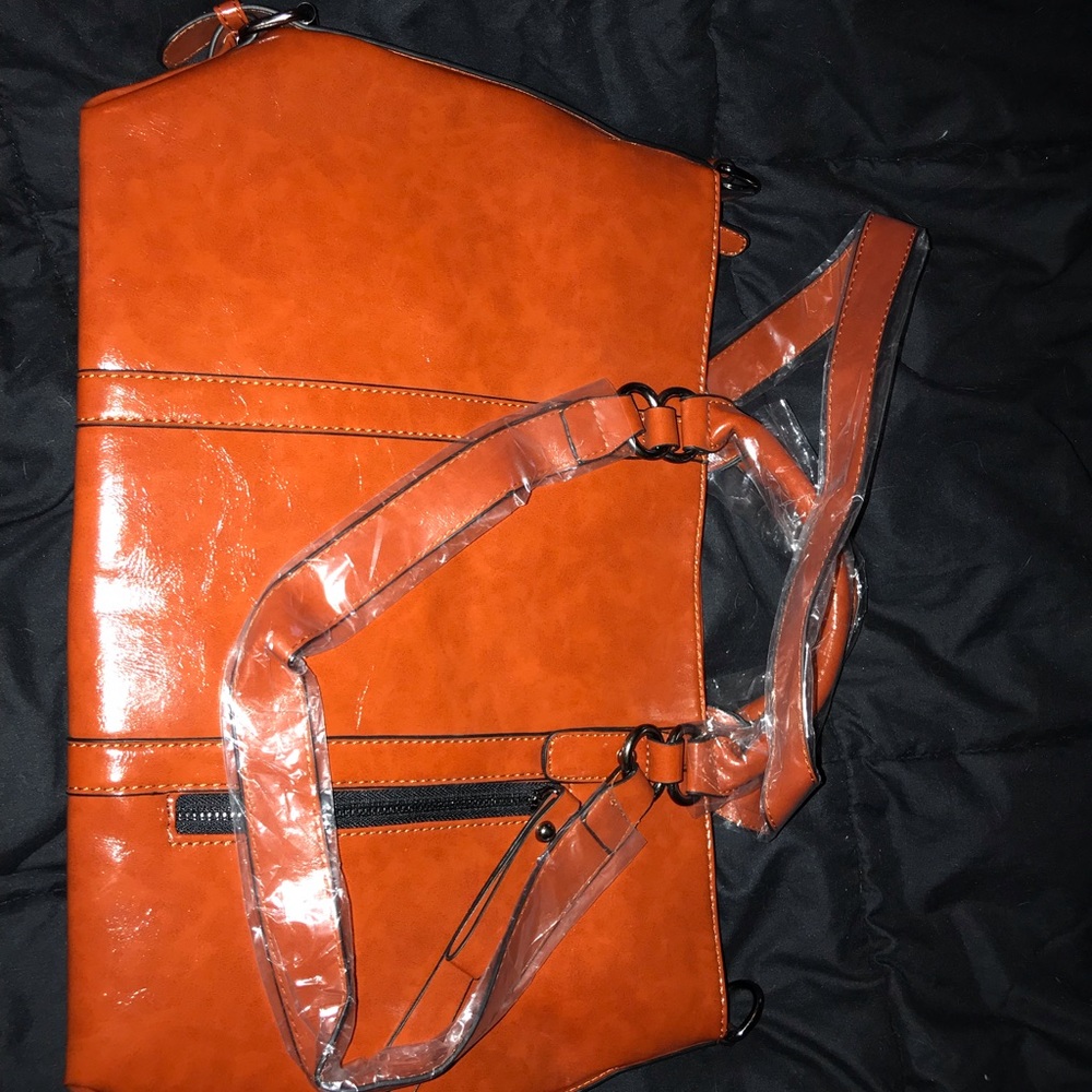 Adorable sable colored handbag. Brand new!